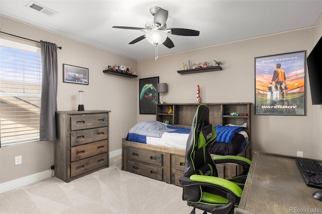 carpeted bedroom with ceiling fan