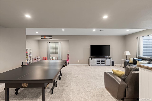 game room featuring light colored carpet