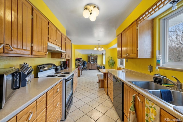 kitchen featuring hanging light fixtures, dishwasher, light tile patterned flooring, electric range oven, and an inviting chandelier