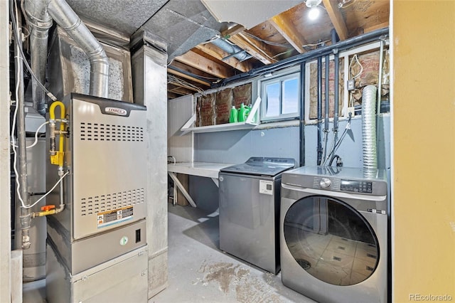 laundry room featuring separate washer and dryer