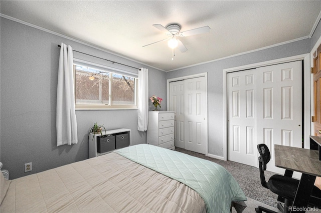 8210 W 72nd Pl, Arvada, CO 80005 - carpeted bedroom with two closets, crown molding, and ceiling fan