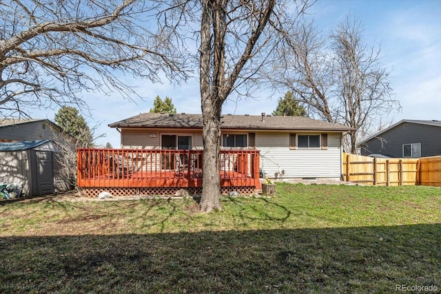 8210 W 72nd Pl, Arvada, CO 80005 - rear view of property featuring a storage shed, a deck, and an outdoor structure