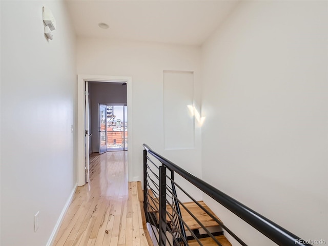 hallway featuring light hardwood / wood-style flooring