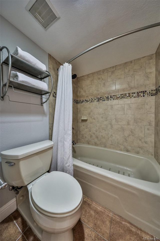 310 Iron Horse Way Unit D5034, Winter Park, CO 80482 - full bath featuring a combined bath / shower with jetted tub, toilet, tile patterned floors, and baseboards