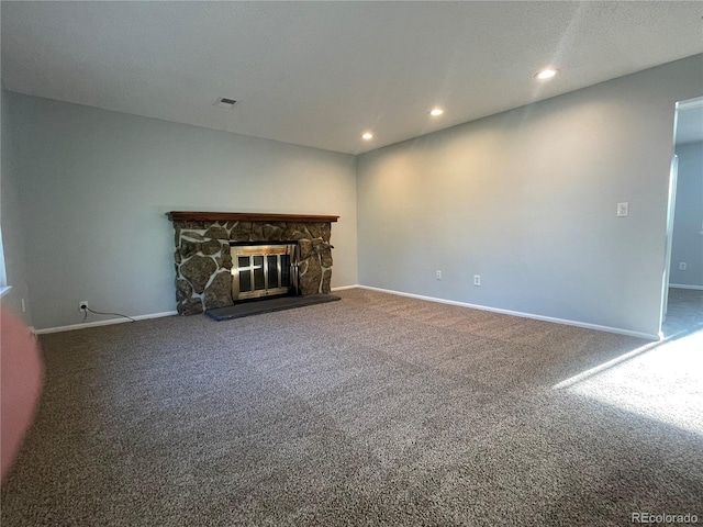 2617 S Cimarron St, Aurora, CO 80014 - unfurnished living room featuring carpet flooring, baseboards, recessed lighting, and a fireplace