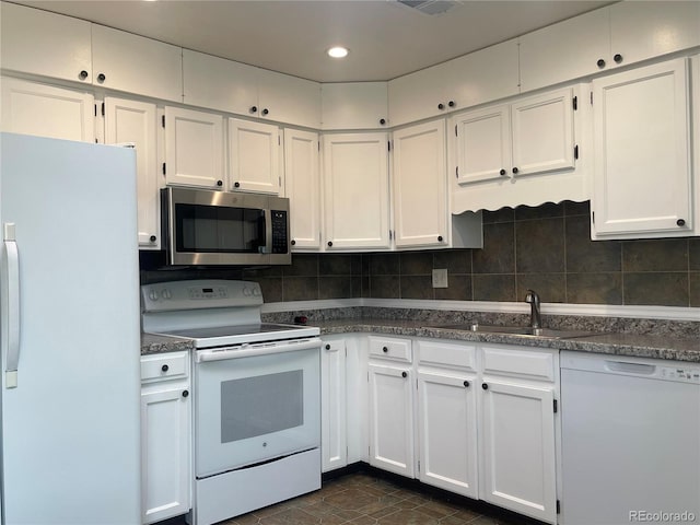 2617 S Cimarron St, Aurora, CO 80014 - kitchen featuring white appliances, a sink, white cabinets, and recessed lighting