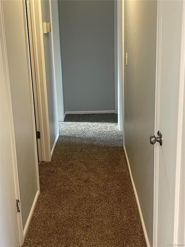 2617 S Cimarron St, Aurora, CO 80014 - hallway featuring carpet and baseboards