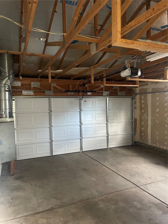 2617 S Cimarron St, Aurora, CO 80014 - garage featuring a garage door opener