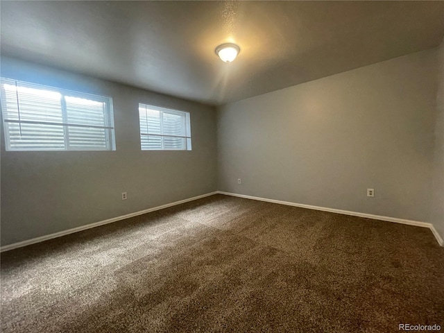 2617 S Cimarron St, Aurora, CO 80014 - empty room with dark carpet and baseboards
