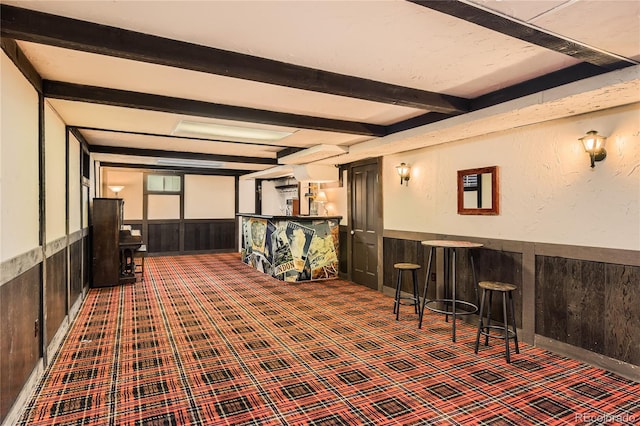 10247 W Arkansas Ave, Lakewood, CO 80232 - interior space with a wainscoted wall, beamed ceiling, carpet floors, and wood walls