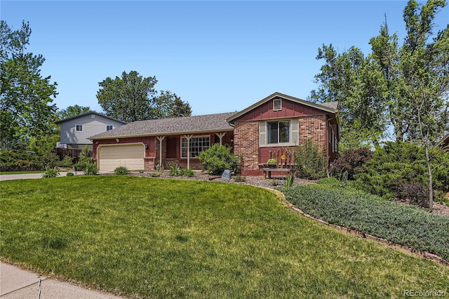 10247 W Arkansas Ave, Lakewood, CO 80232 - ranch-style home with board and batten siding, an attached garage, brick siding, and a front yard