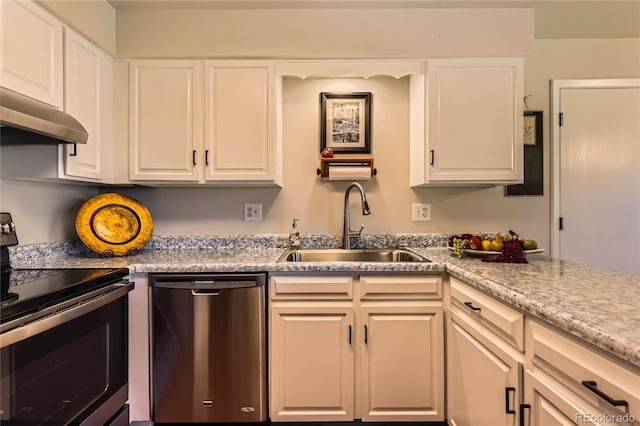 10247 W Arkansas Ave, Lakewood, CO 80232 - kitchen featuring appliances with stainless steel finishes, a sink, under cabinet range hood, white cabinets, and light countertops