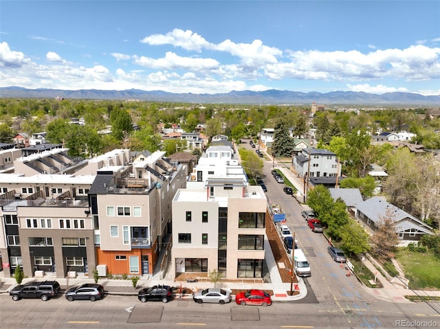 birds eye view of property featuring a mountain view