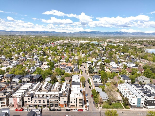 birds eye view of property featuring a mountain view