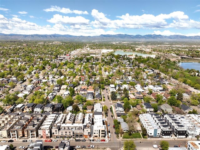 bird's eye view featuring a water and mountain view