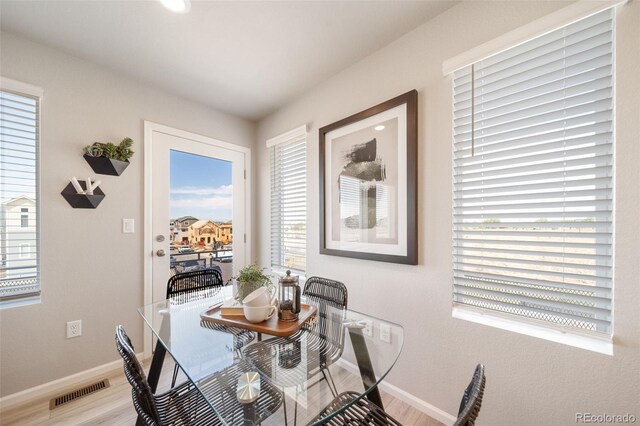 13616 E 103rd Pl, Commerce City, CO 80022 - dining room with light wood-type flooring