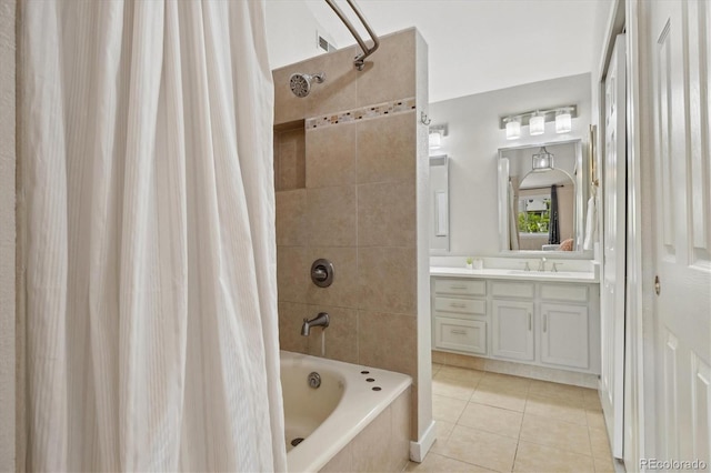 bathroom featuring tile patterned floors, shower / tub combo, and vanity