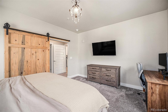 15274 W 64th Ln Unit 206, Arvada, CO 80007 - carpeted bedroom featuring baseboards and a barn door