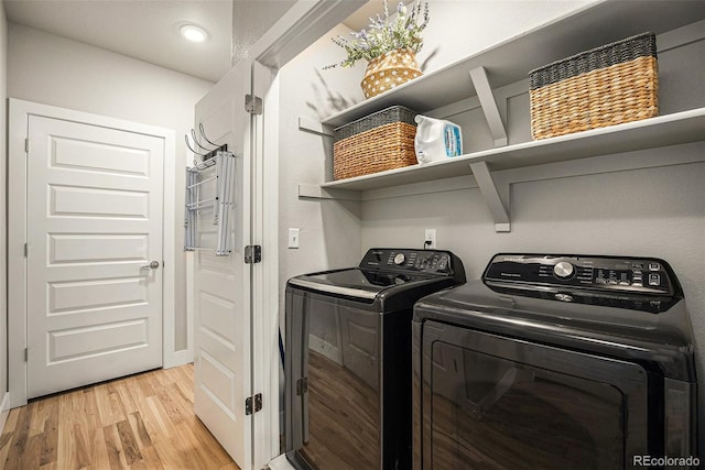 15274 W 64th Ln Unit 206, Arvada, CO 80007 - laundry area with laundry area, recessed lighting, light wood-style floors, and washing machine and clothes dryer