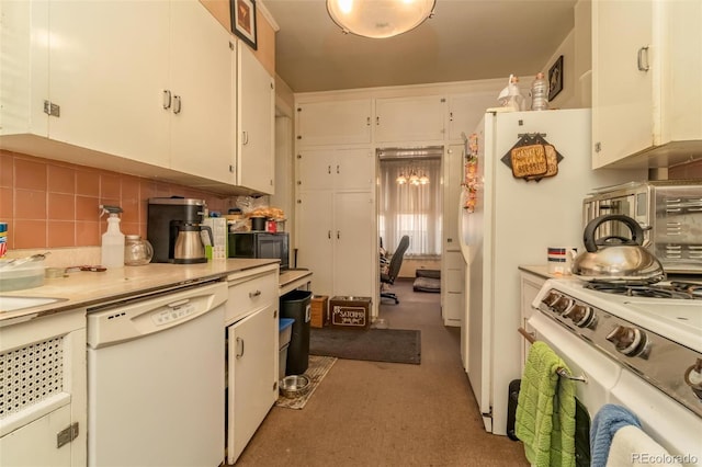 kitchen featuring tasteful backsplash, white cabinetry, and white appliances