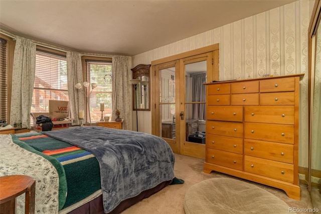 bedroom featuring light colored carpet