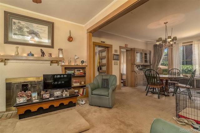 carpeted living room with a chandelier and ornamental molding