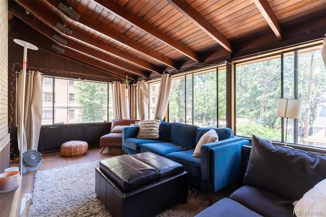 sunroom with vaulted ceiling with beams and wood ceiling