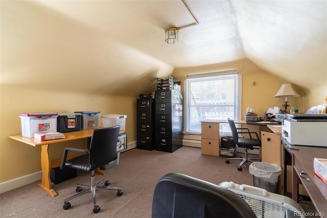 carpeted home office with lofted ceiling