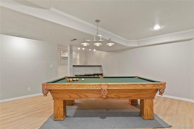 playroom featuring billiards, ornamental molding, and hardwood / wood-style floors