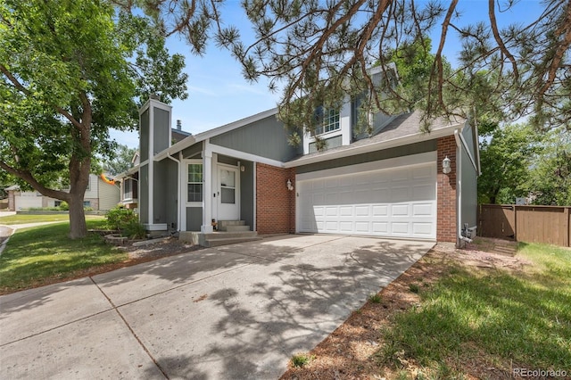 944 E Lily Ct, Highlands Ranch, CO 80126 - mid-century home with brick siding, driveway, and a chimney