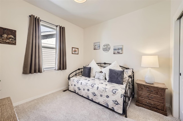 bedroom with light carpet