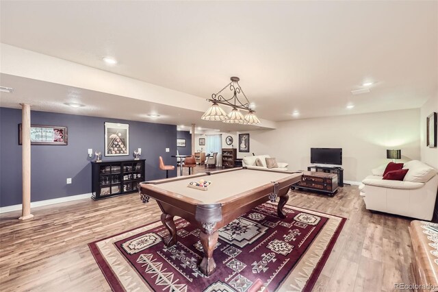 game room featuring billiards and light hardwood / wood-style flooring