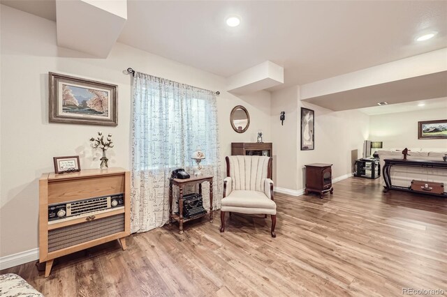 living area featuring hardwood / wood-style flooring