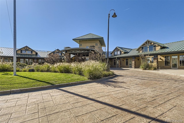 view of community featuring a yard