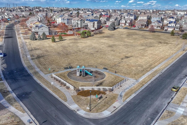 birds eye view of property with a residential view
