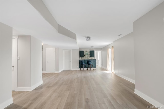 725 Nebula Ct, Colorado Springs, CO 80906 - unfurnished living room with light wood-style flooring