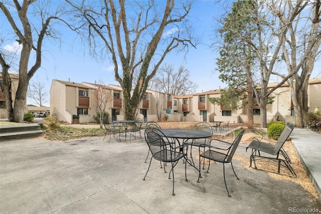 1060 S Parker Rd Unit 19, Denver, CO 80231 - view of patio with a residential view and outdoor dining space