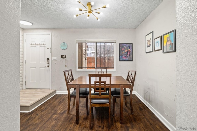 1060 S Parker Rd Unit 19, Denver, CO 80231 - dining area featuring a textured ceiling, wood finished floors, a chandelier, baseboards, and a textured wall