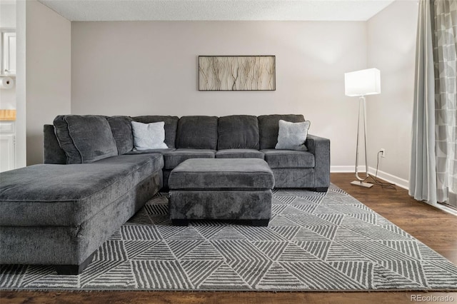 1060 S Parker Rd Unit 19, Denver, CO 80231 - living area with wood finished floors and baseboards