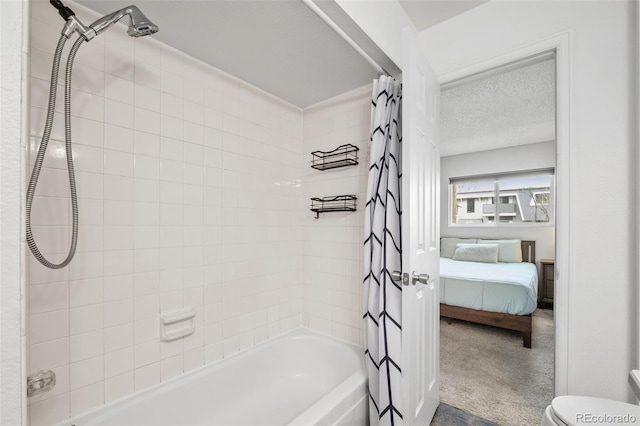 1060 S Parker Rd Unit 19, Denver, CO 80231 - ensuite bathroom with shower / bath combo with shower curtain and toilet