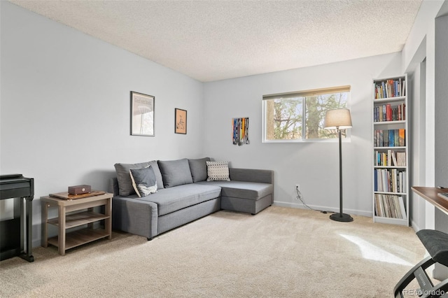 1060 S Parker Rd Unit 19, Denver, CO 80231 - carpeted living room with a textured ceiling and baseboards