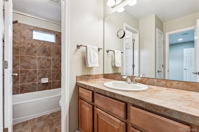 12427 James Ct, Broomfield, CO 80020 - bathroom with vanity and shower / washtub combination