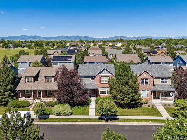 12427 James Ct, Broomfield, CO 80020 - aerial perspective of suburban area featuring mountains
