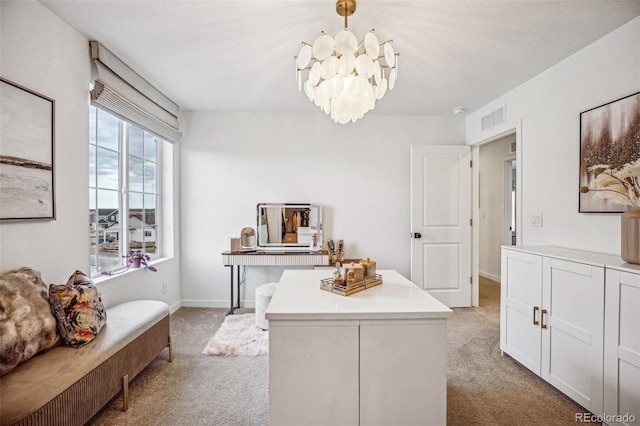 office featuring an inviting chandelier, baseboards, visible vents, and light colored carpet