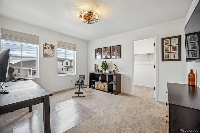 office area with carpet and baseboards