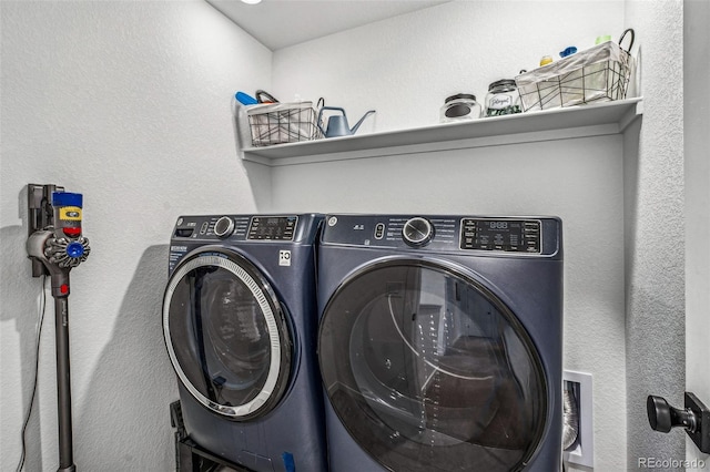 clothes washing area with laundry area and independent washer and dryer