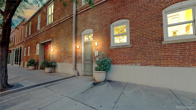 1510 Wazee St Unit 3, Denver, CO 80202 - entrance to property featuring brick siding and a patio area
