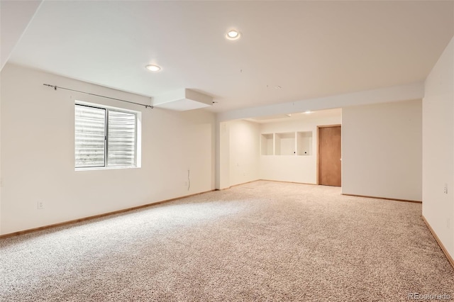 2307 S Ensenada St, Aurora, CO 80013 - empty room featuring light carpet, recessed lighting, and baseboards