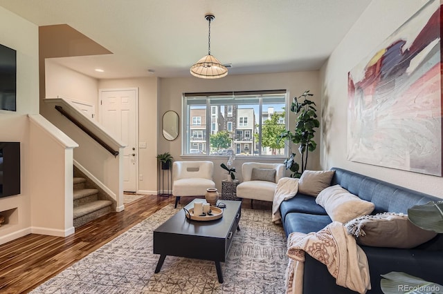 504 E Dry Creek Pl, Littleton, CO 80122 - living area with wood finished floors, stairs, baseboards, and recessed lighting