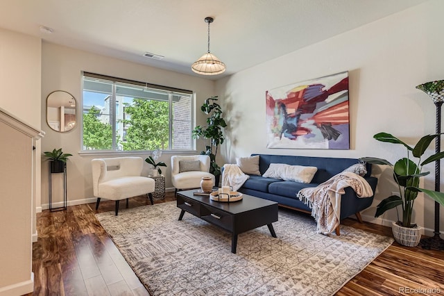 504 E Dry Creek Pl, Littleton, CO 80122 - living area featuring wood finished floors and baseboards